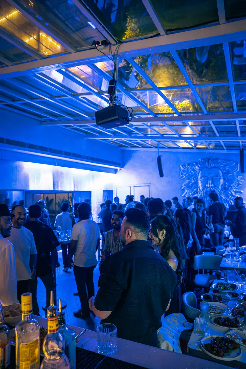 A packed night under the glass roof